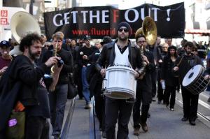 Anti-fluoridation march image via Shutterstock