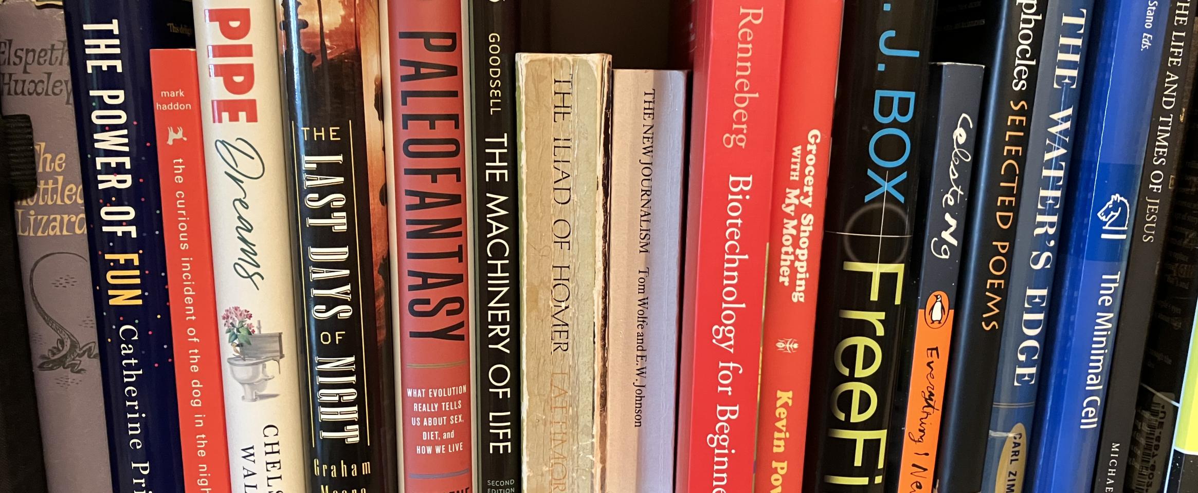 Rectangular photo of Ted Anton’s office bookshelf with titles on biotechnology and literature, reflecting both his book’s topic and his work as a professor of English at DePaul University. Photo credit Ted Anton.