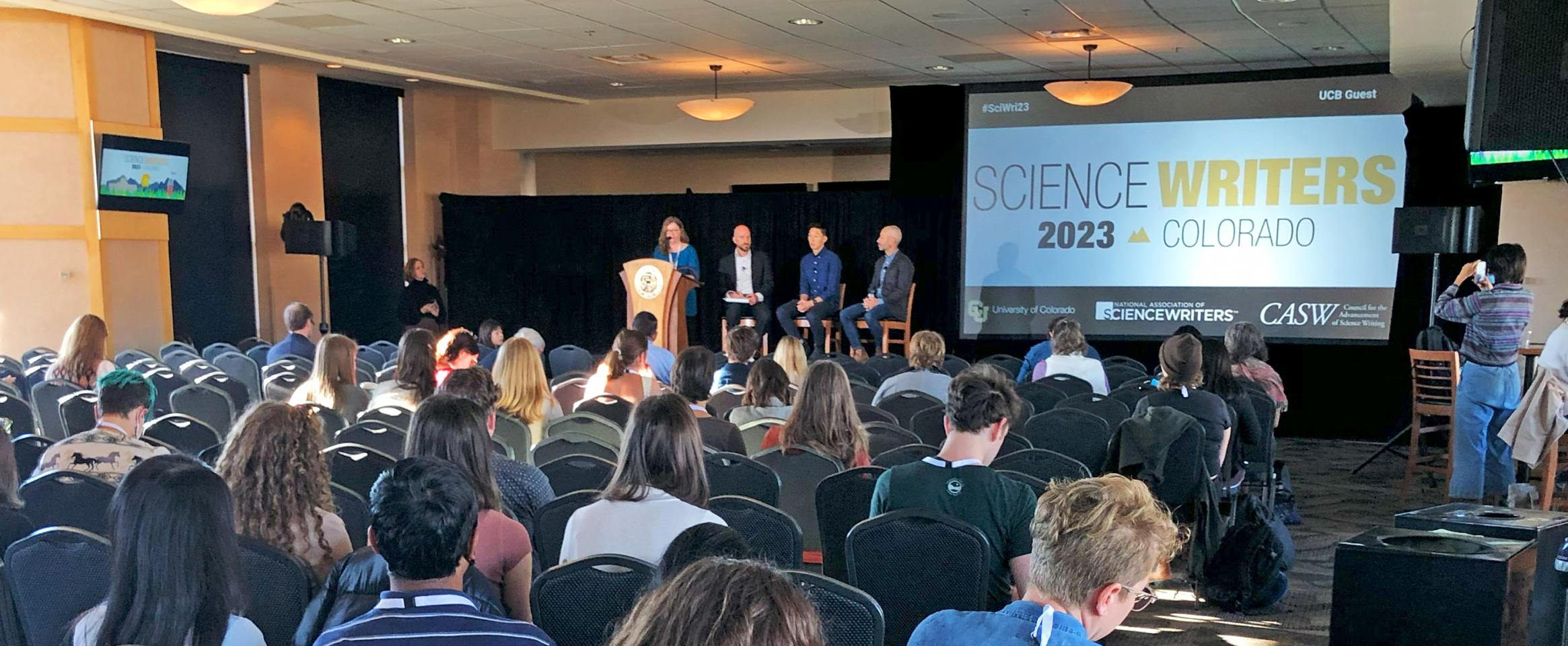 Square photo of attendees listening to Rebecca Boyle introduce the Reporting on Indigenous Communities plenary at Science Writers 2023. Photo by Ben Young Landis.