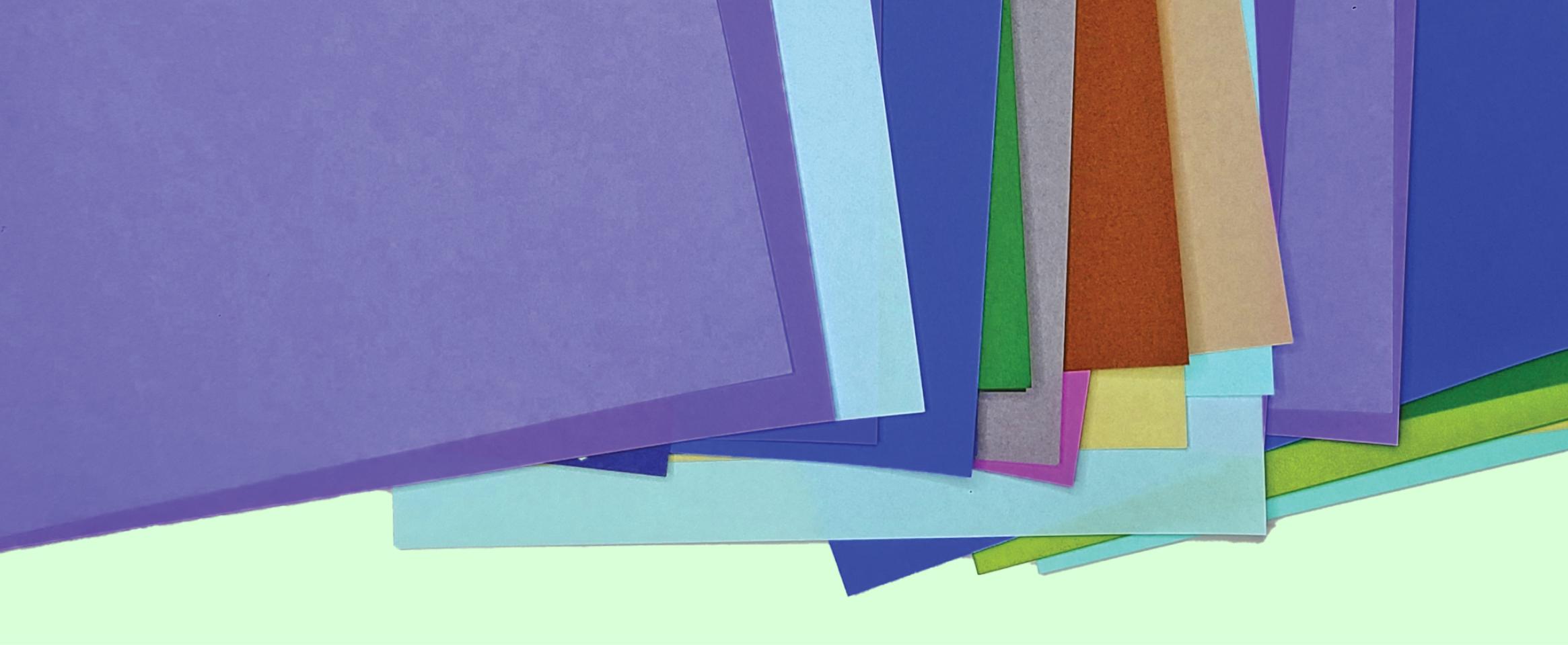 Illustration simulating origami paper overlapping in different colors.