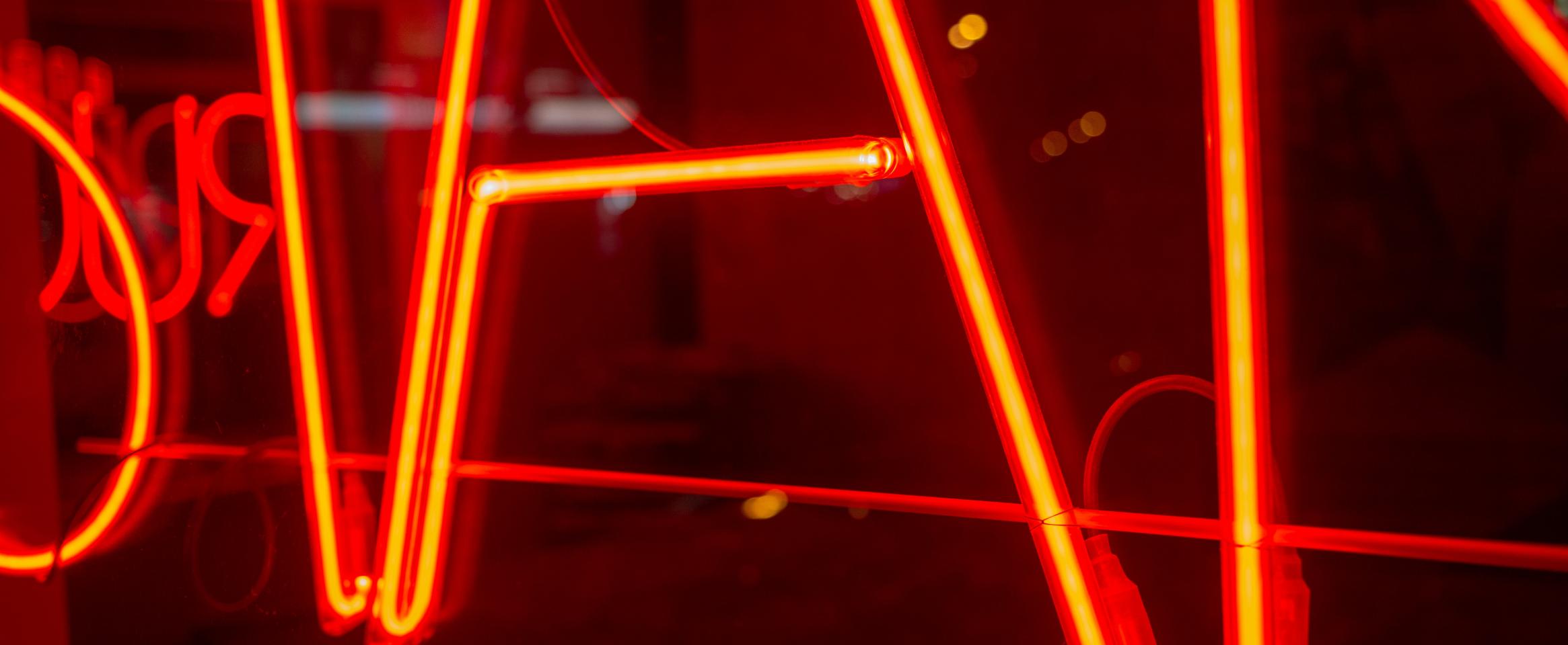 Orange neon sign close-up