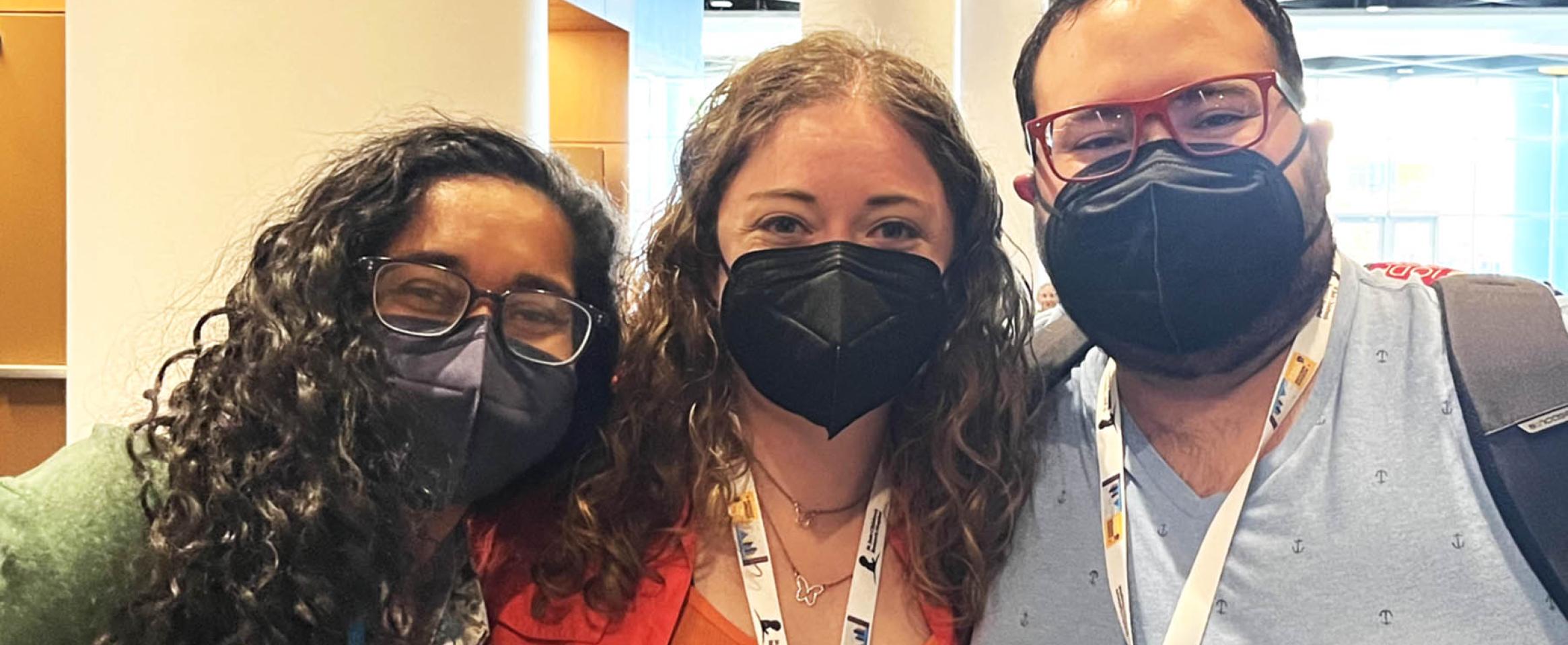 NASW members smile behind their masks while arm in arm at the Science Writers 2022 annual meeting in Memphis. Photo credit Rebekah White.