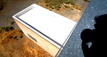 Installing a cool roof or painting the roof white can reduce heat absorption or increase heat reflection.