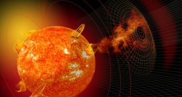 This artist’s depiction shows an active sun that has released a coronal mass ejection.  Credit: NASA