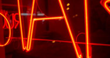 Orange neon sign close-up