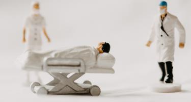 Abstract doctors and patient