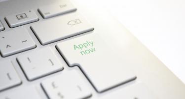 Keyboard with "apply" key