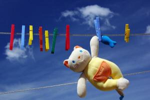 Teddy bear on clothesline