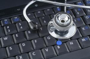 Laptop and stethoscope Laptop and stethoscope