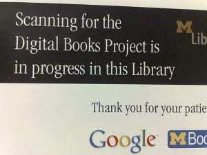 Google Books scanning notice in library