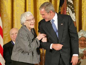 President George W. Bush awards the Presidential Medal of Freedom to author Harper Lee during a ceremony Monday, Nov. 5, 2007, in the East Room.