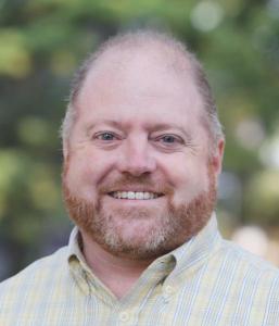 A headshot of Tim Bonfield