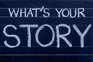 Chalkboard reading "What's your story?"