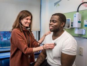 Emmanuel “Manny” Johnson, Jr., seen here with clinical researcher Erica Esrick, was the first volunteer for a Dana Farber/Boston Children’s gene therapy trial for sickle cell disease.