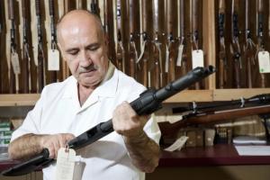Gun dealer image via Shutterstock