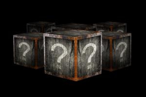 Boxes with question marks, image via Shutterstock