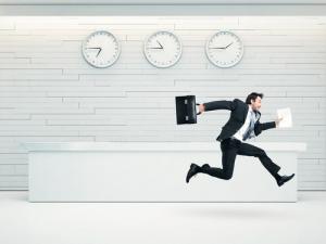 Running businessman image via Shutterstock
