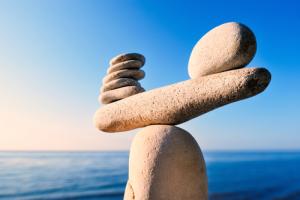 Balancing stones image via Shutterstock