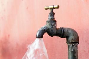Running faucet image via Shutterstock