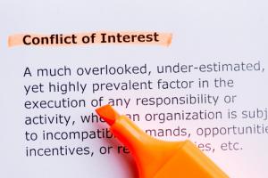 Conflict of interest definition image via Shutterstock
