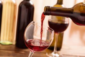 Pouring wine image via Shutterstock