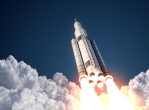 Rocket launch image via Shutterstock