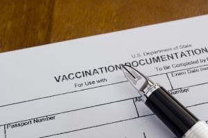 Vaccination form image via Shutterstock