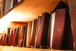Shelved papers image via Shutterstock