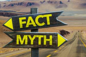 Fact/myth signposts image via Shutterstock