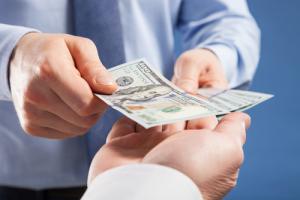Cash handout image via Shutterstock