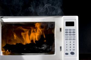 Microwave oven fire image via Shutterstock