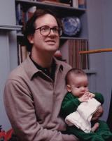 Vertical portrait photo from 1987 of author Richard Maurer and newborn son.