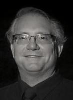 Mark E. Lasbury